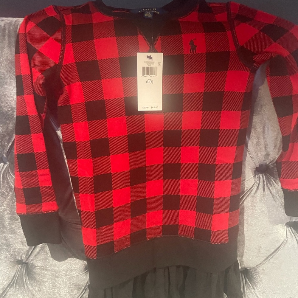 Girls Polo cute dress. Just took out the plastic never got to wear now too small